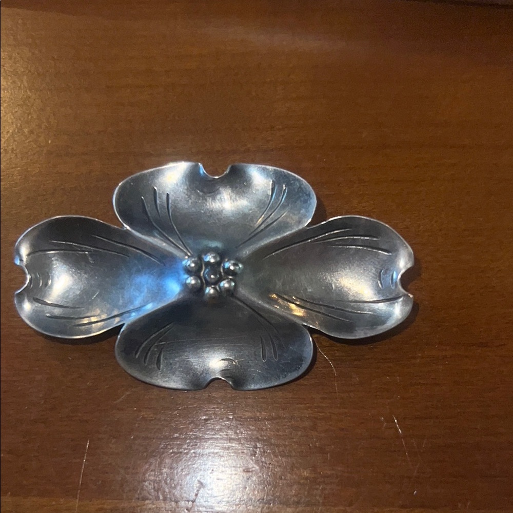 Vintage handmade sterling silver flower brooch.
